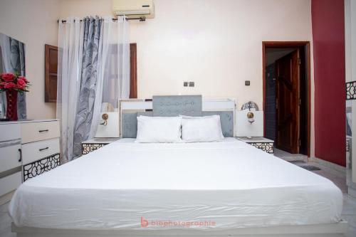 Postel nebo postele na pokoji v ubytování Cabral residence