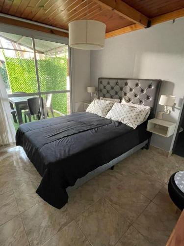 Ένα ή περισσότερα κρεβάτια σε δωμάτιο στο Lo del Turco