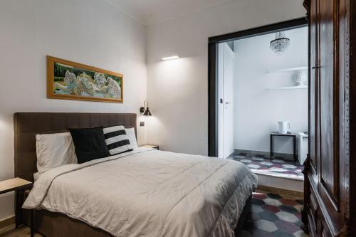 Ένα ή περισσότερα κρεβάτια σε δωμάτιο στο La Dimora sotto le Stelle