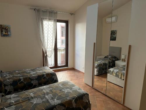 Postel nebo postele na pokoji v ubytování Casa D'Amuri