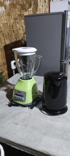 a blender sitting on top of a counter at casa rústica in Ica