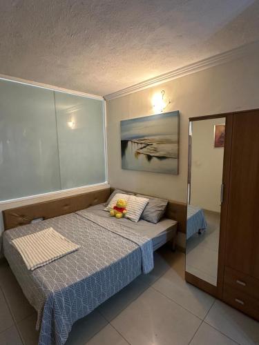 Giường trong phòng chung tại Perfect 2-Bedroom Apartment in St Julian