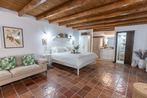 Ένα ή περισσότερα κρεβάτια σε δωμάτιο στο Hacienda La Miranda