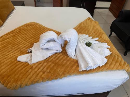 Ένα ή περισσότερα κρεβάτια σε δωμάτιο στο Aqua Stone guest house