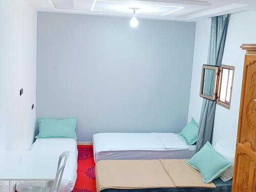 Aziz House 1客房内的一张或多张床位