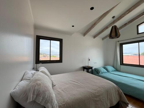 Postel nebo postele na pokoji v ubytování Casa en Laguna de Zapallar a pasos de la playa, recién remodelada