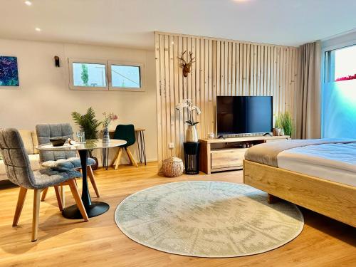 Μια τηλεόραση ή/και κέντρο ψυχαγωγίας στο Alpenglanz Deluxe Studio