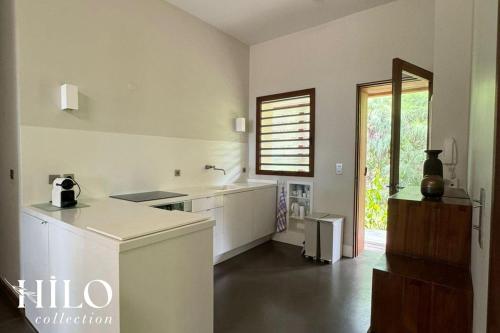 Kuchyň nebo kuchyňský kout v ubytování Noddi Beach Villa La Saline by HILO Collection