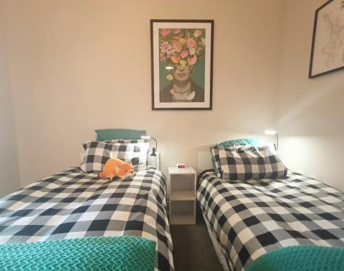 En eller flere senge i et værelse på Guest Wing on Glasgow