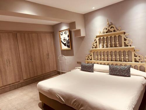 Ένα ή περισσότερα κρεβάτια σε δωμάτιο στο Penthouse royale avec piscine privé