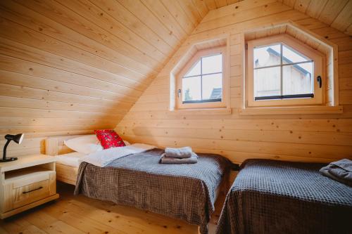 Postel nebo postele na pokoji v ubytování Na Wierchach