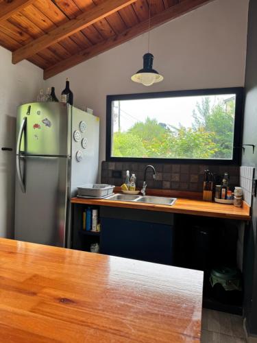 Kuchyň nebo kuchyňský kout v ubytování La Arboleda, Casa vacacional familiar