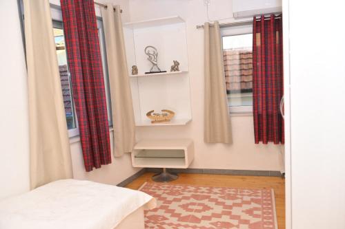 Postel nebo postele na pokoji v ubytování Apartman Natalija