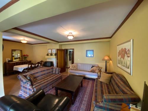 a living room with a couch and a table at Tito's Place in Ohrid