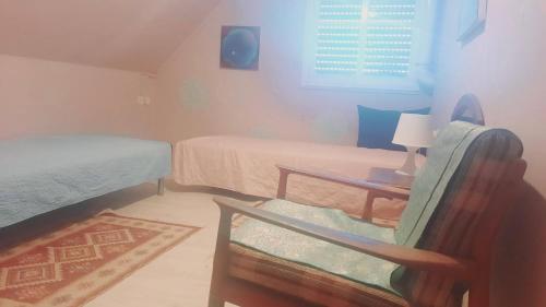 Postel nebo postele na pokoji v ubytování הבית של גלגל