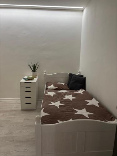 Postel nebo postele na pokoji v ubytování Apartmánový byt VYHNE