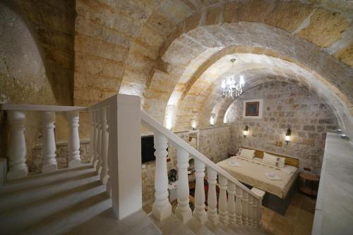 a staircase in a castle with a sink in a room at View Cave Hotel in Goreme
