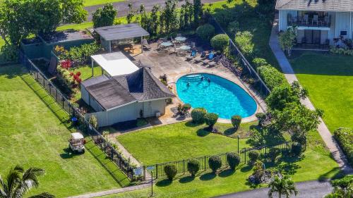 an aerial view of a house with a swimming pool at Alii Kai 7201 in Princeville