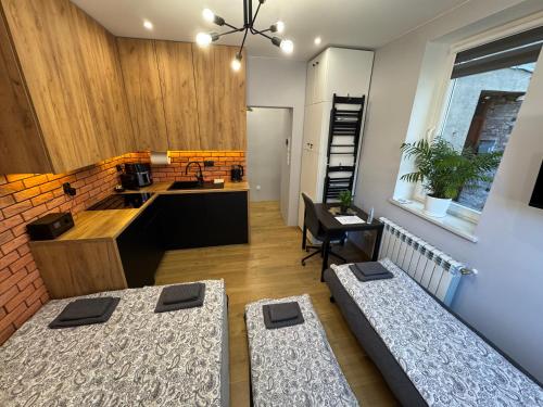 Postel nebo postele na pokoji v ubytování MiniStudio Zbąszyń