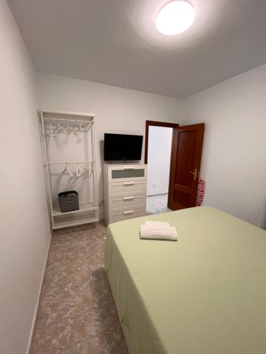 Postel nebo postele na pokoji v ubytování El Cecilio