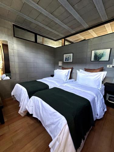 Ένα ή περισσότερα κρεβάτια σε δωμάτιο στο Pedre Loft