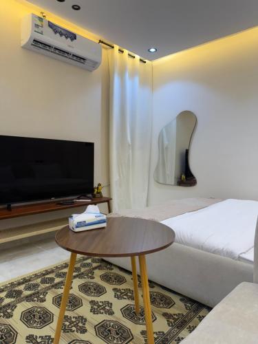 En eller flere senge i et værelse på ستديو هادئ راقي