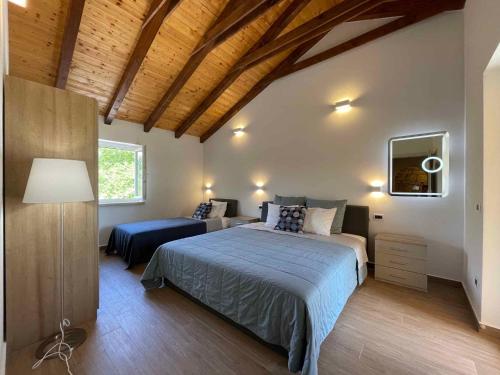 En eller flere senge i et værelse på Holiday home in Nedescina 43269