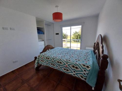 Ένα ή περισσότερα κρεβάτια σε δωμάτιο στο La Albufera