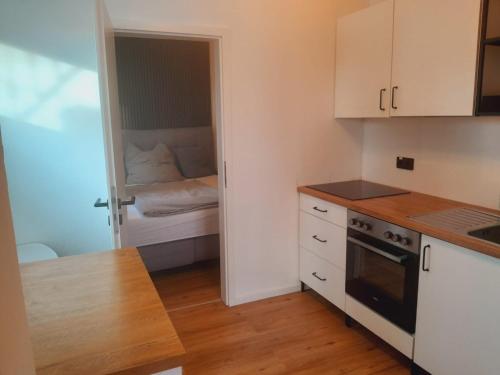 Η κουζίνα ή μικρή κουζίνα στο Krausiebers Wohlfühlapartment - Moderne Unterkunft an der A44 Velbert-Heiligenhaus