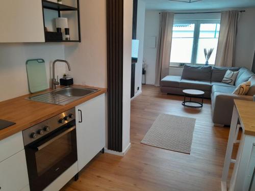 Η κουζίνα ή μικρή κουζίνα στο Krausiebers Wohlfühlapartment - Moderne Unterkunft an der A44 Velbert-Heiligenhaus