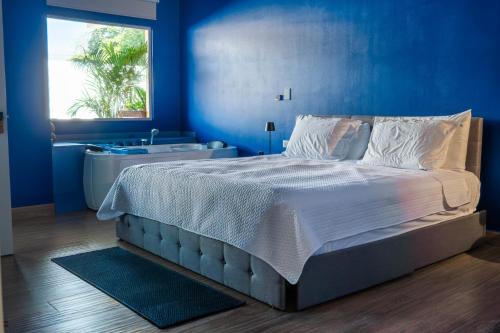 Postel nebo postele na pokoji v ubytování Habitare - La Fortuna