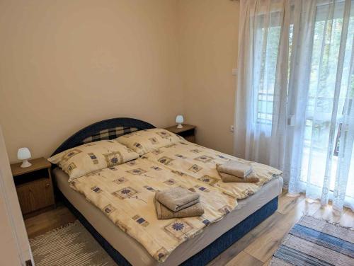 Postel nebo postele na pokoji v ubytování Apartment in Keszthely - Balaton 54817