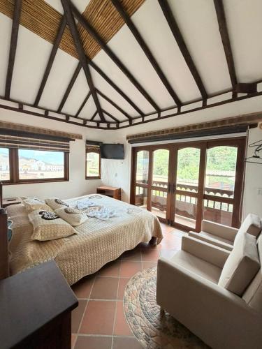 Ένα ή περισσότερα κρεβάτια σε δωμάτιο στο La Casa Colonial Imperial