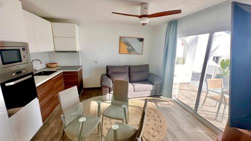 Η κουζίνα ή μικρή κουζίνα στο Las Palmeras del Sol