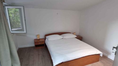 En eller flere senge i et værelse på Apartment in Biograd na Moru 35590