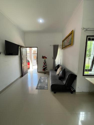 TV a/nebo společenská místnost v ubytování Casa de Brisa BnB