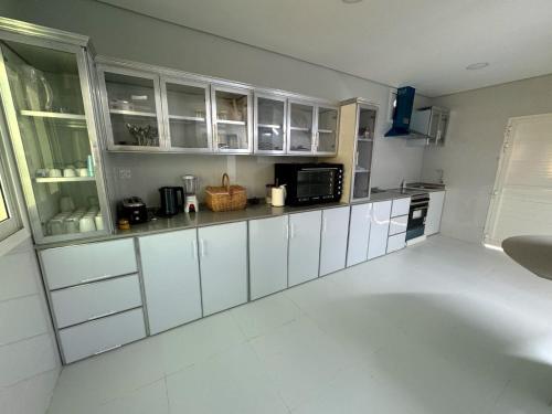 Kuchyň nebo kuchyňský kout v ubytování Luxury Ocean View Room