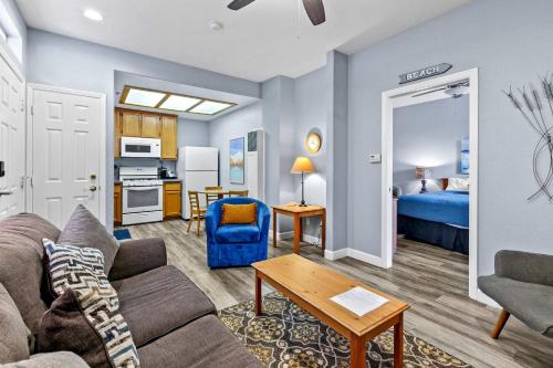 a living room with a couch and a table at Peaceful Palace in Oceano