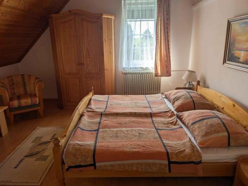 Ένα ή περισσότερα κρεβάτια σε δωμάτιο στο Holiday home in Gyenesdias - Balaton 54827