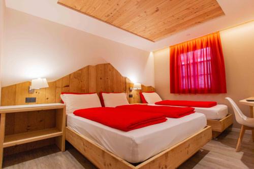 Ένα ή περισσότερα κρεβάτια σε δωμάτιο στο Ampas Francescato