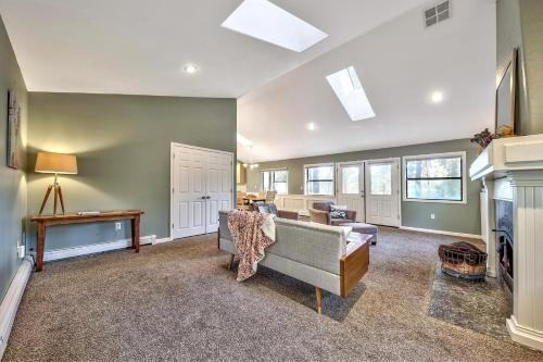 a living room with a couch and a fireplace at Minnow's Run in Brockway Vista