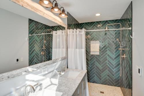 a bathroom with a shower and a sink and a mirror at Private Pool and Home Theater Buchanan Family Home! in Buchanan