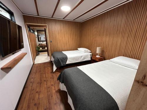 Een bed of bedden in een kamer bij Motherhome