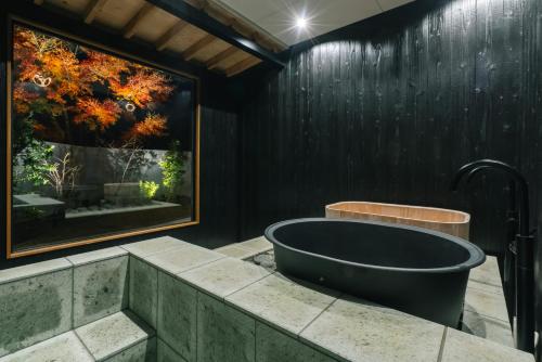 Koupelna v ubytování private your resort ITTEKURAi 松山