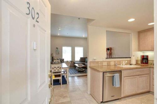 a kitchen with a sink and a counter top at Downtown Pismo Beach modern updated single-level in Pismo Beach