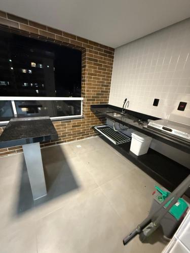 Küche/Küchenzeile in der Unterkunft Priority Praia Grande