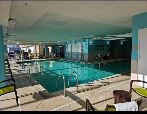 a large swimming pool in a large building at Springhill suites by Marriott in Macon