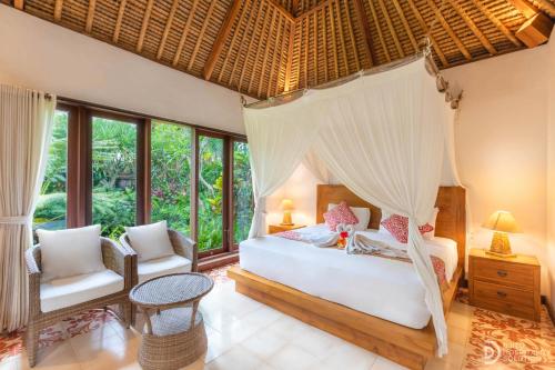 Ένα ή περισσότερα κρεβάτια σε δωμάτιο στο Gopala Villa Ubud