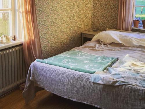 Ένα ή περισσότερα κρεβάτια σε δωμάτιο στο 5 person holiday home in FLISBY