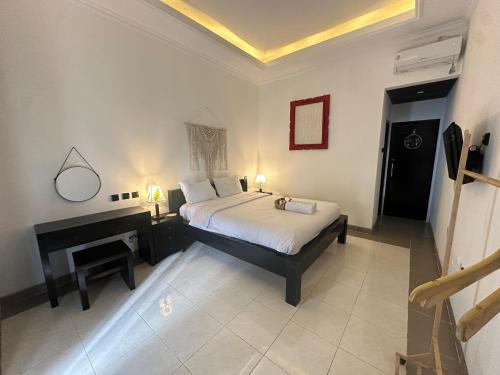 Postel nebo postele na pokoji v ubytování Little White Pavilion小白楼